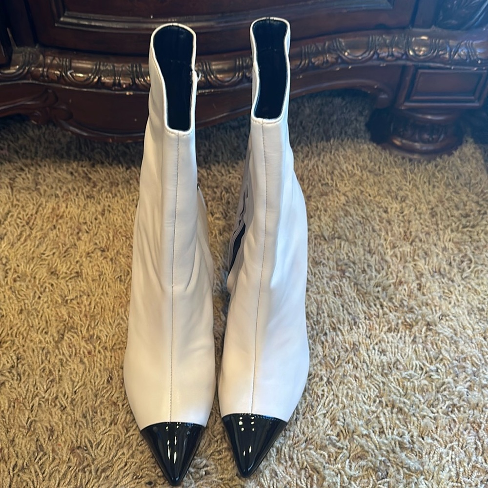 Brand new Nine West Winner boots in ivory with black patent leather top.